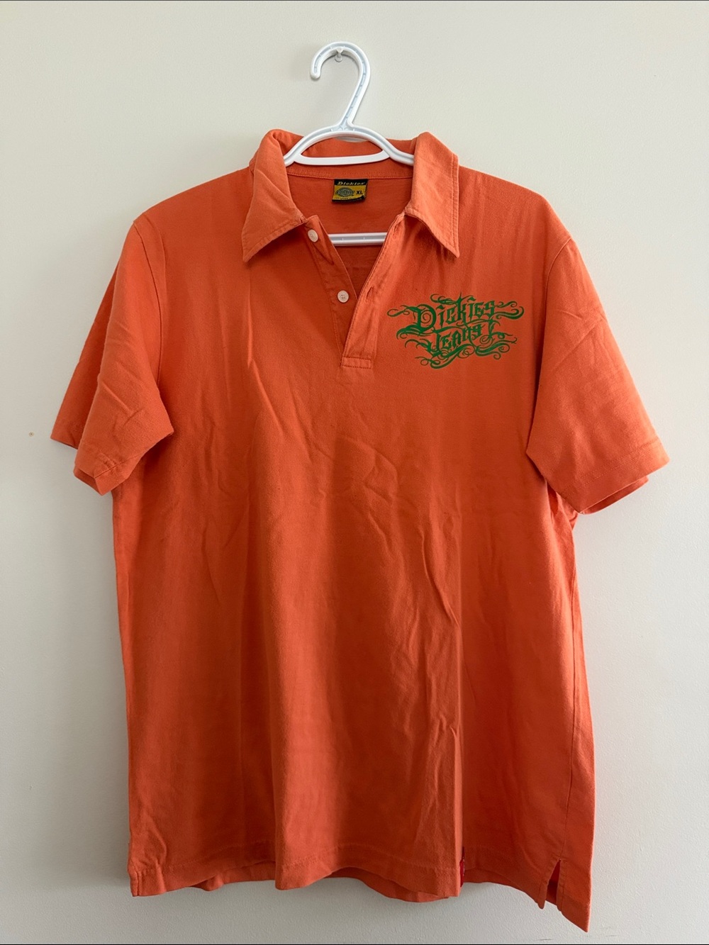 Vintage Dickies Orange Short-Sleeve Polo with Chest Script Logo and Back Graphic